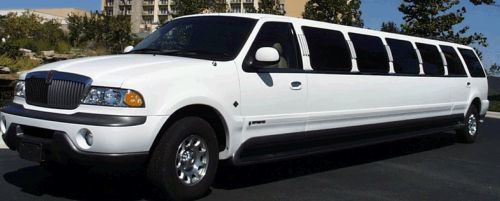 Chauffeur stretch white Lincoln Navigator limo hire in UK