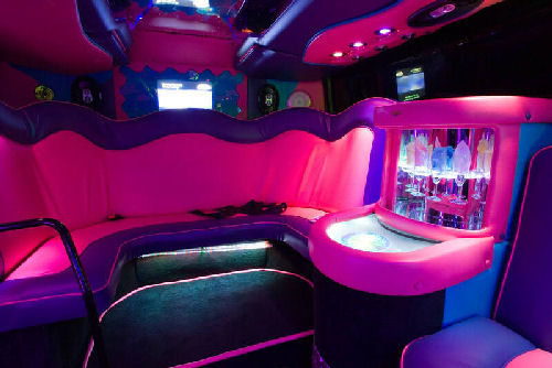 Chauffeur driven Party Bus limousine hire interior in Bristol, Gloucester, Cheltenham, Cardiff, Wales, Weston Super Mare, and Bath.