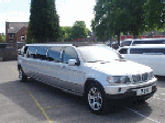 Chauffeur stretched silver BMW X5 limousine hire in Nottingham, Derby, Nottinghamshire, Derbyshire, Midlands.