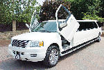 Chauffeur stretched white Ford Excursion 4x4 limo hire with Lamborghini doors in Sheffield, Rotherham, Barnsley, Doncaster, Huddersfield, South Yorkshire