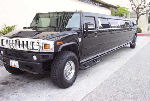 Chauffeur stretch black Hummer H2 limo hire in Liverpool, Manchester, Bolton, Warrington, North West