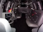 Chauffeur stretched Lincoln Navigator limousine hire interior in UK