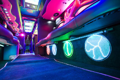Chauffeur driven Party Bus limo hire interior in Bristol, Gloucester, Cheltenham, Cardiff, Wales, Weston Super Mare, and Bath.